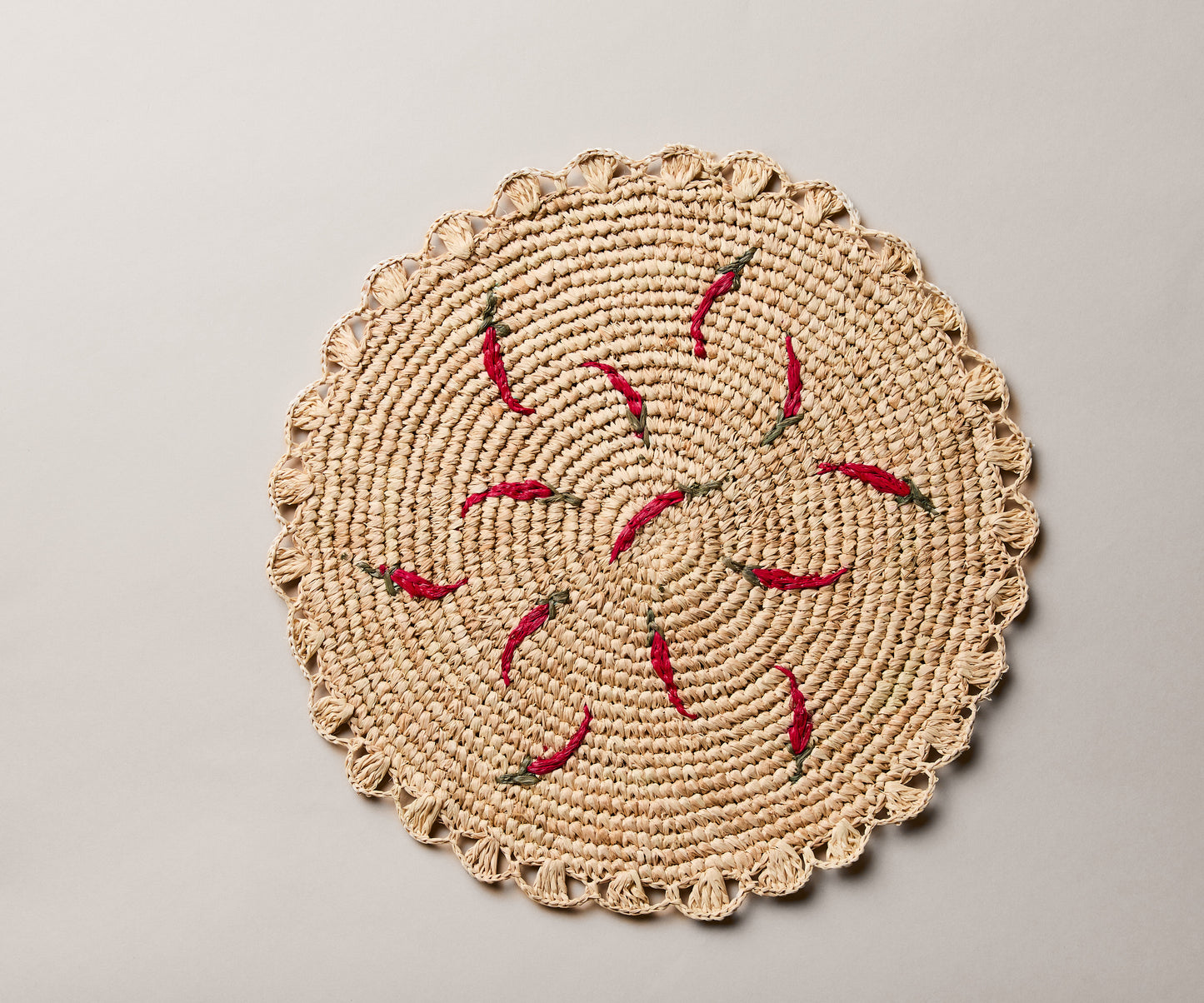 Scattered Chili Handwoven Raffia Round Placemat – Artisan Table Décor