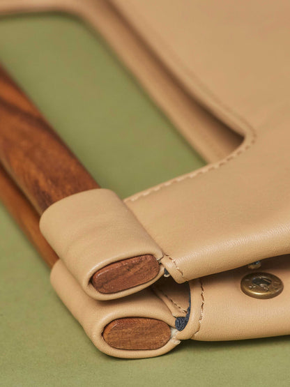 Leather-Tote-Handbag-Wood-Cut-Out-Tote-by-Payton-James-Cappucino-Tan-Color closeup of wood handle