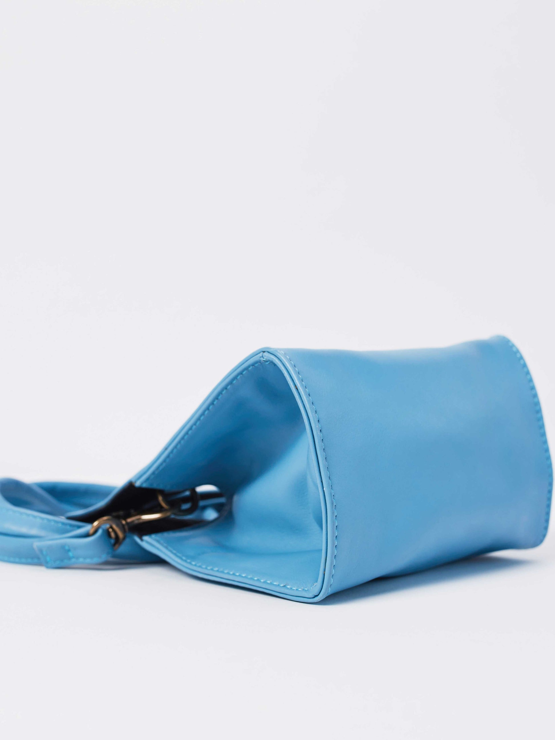 Leather- Crossbody Handbag- Vintage Blue Mini Party Crossbody bag-by-PaytonJames-Nashville-designer side view of bag